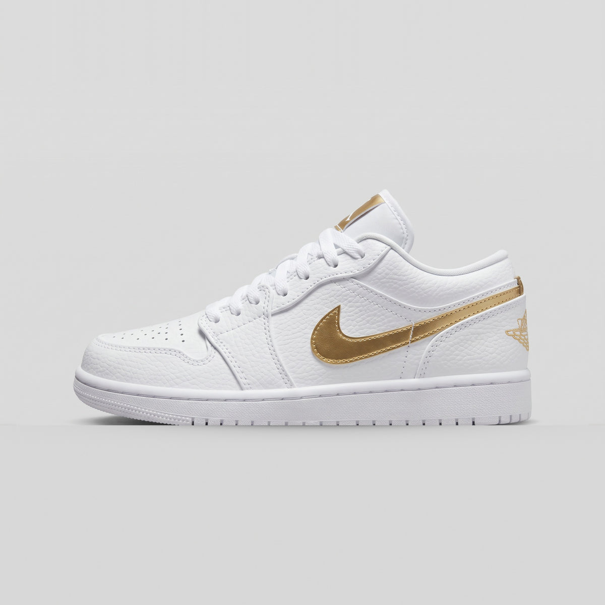 Nike Air Jordan 1 Low Blanco Dorado - vista lateral izquierda