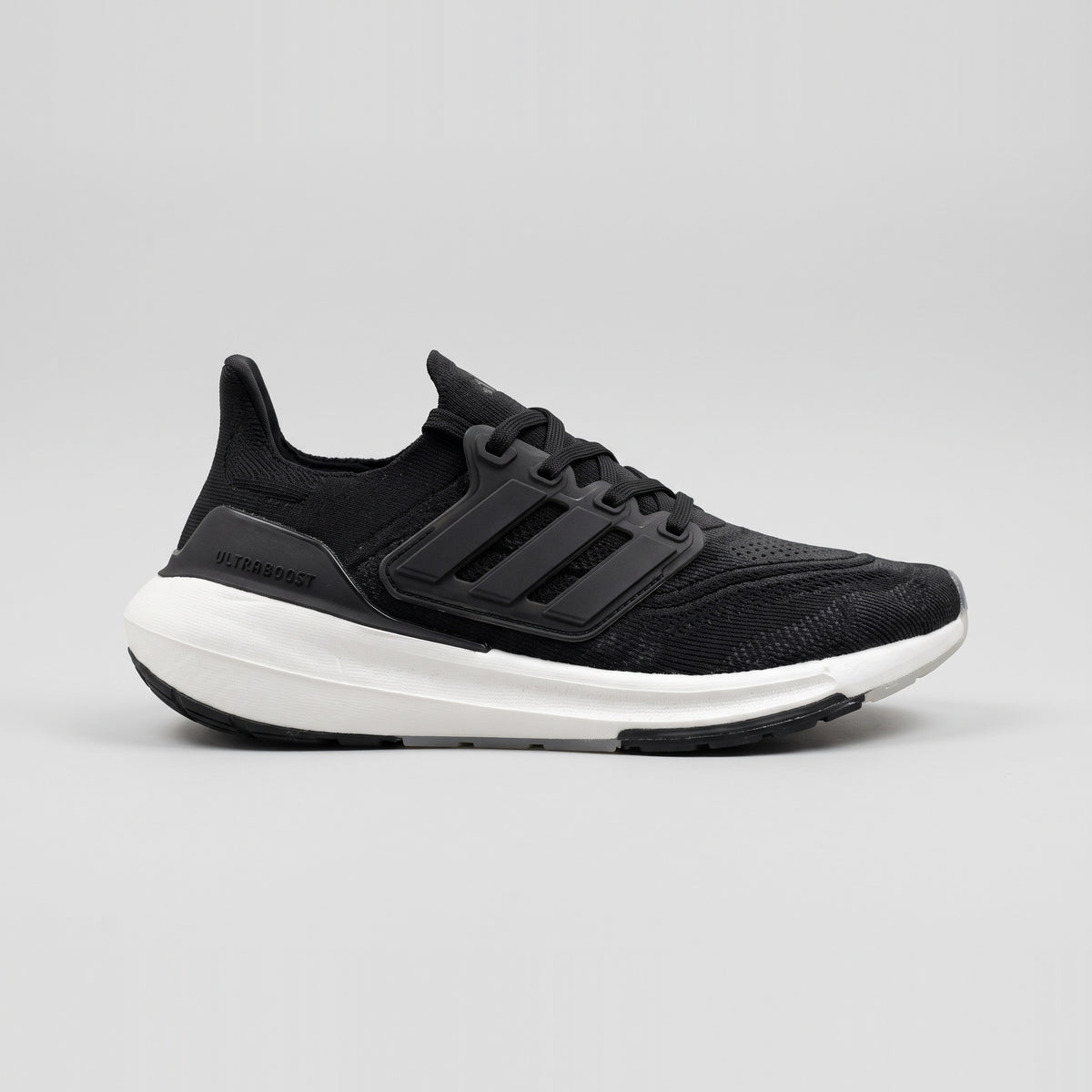Adidas Ultraboost Light Negro Suela Blanca vista lateral