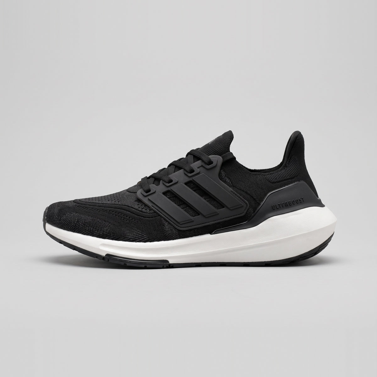 Adidas Ultraboost Light Negro Suela Blanca vista lateral izquierda