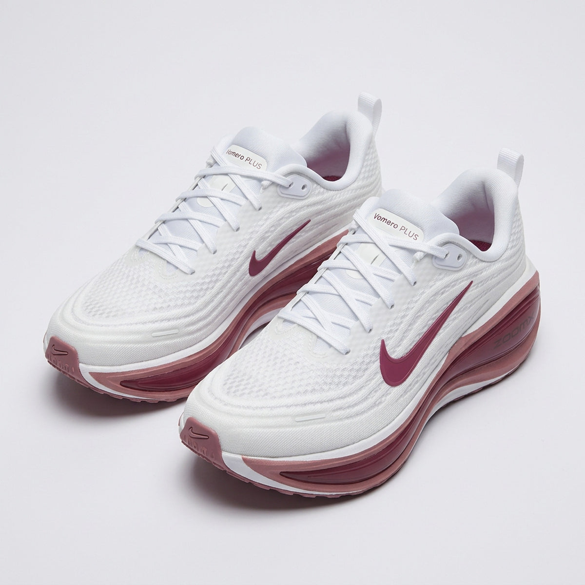 Par de Nike Vomero Plus Blanco Frambuesa